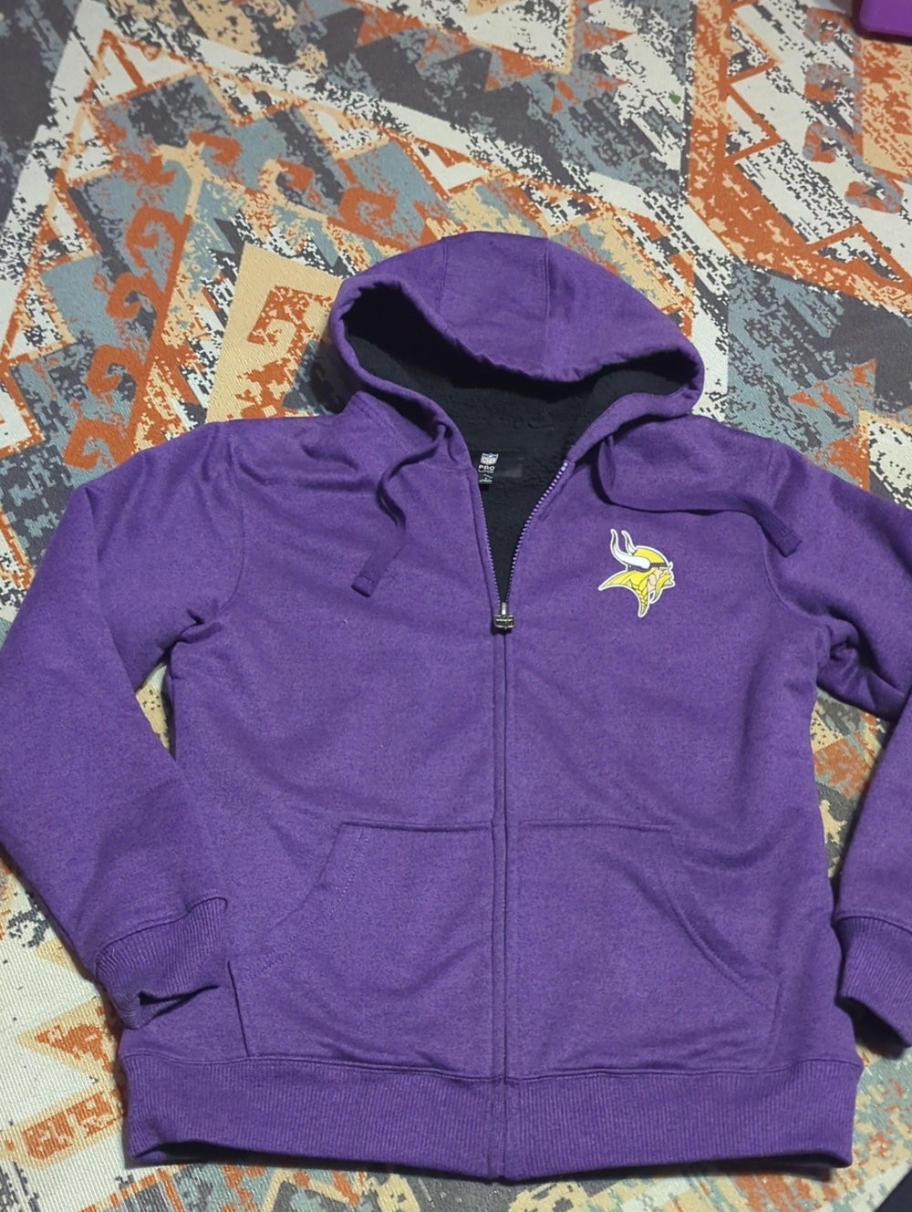 an NFL Pro Line Minnesota Vikings Sherpa-Lined Full-Zip Hoodie